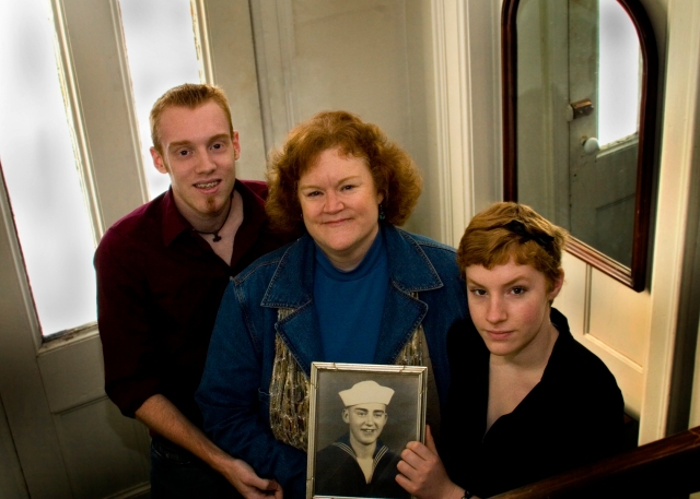 My two children Sam and Kate and I hold Clarence Fairchild's Navy photograph.  Kate is wearing his wool government issue Navy Pants.