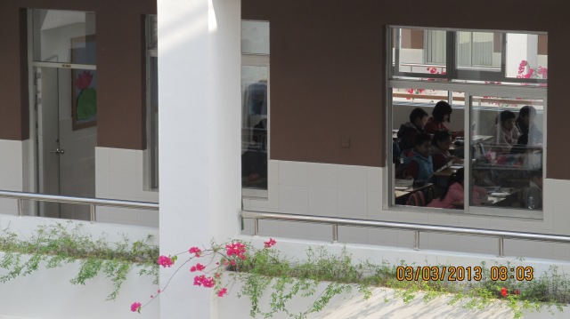 Here is a close up of the balconies where children relax for ten minutes between classes.  Because we are in the tropics, everything is open aired.